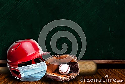 Baseball Helmet Wearing Mask With Chalkboard Background and Copy Space Stock Photo