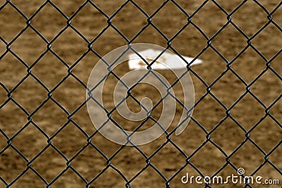 Baseball Home Plate and Backstop Fence Stock Photo