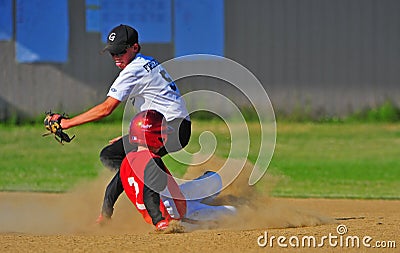 Baseball moving for the tag. Editorial Stock Photo