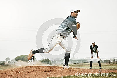 Baseball, pitch and team sports of a man pitcher busy with teamwork, fitness and fast ball throw. Baseball player Stock Photo