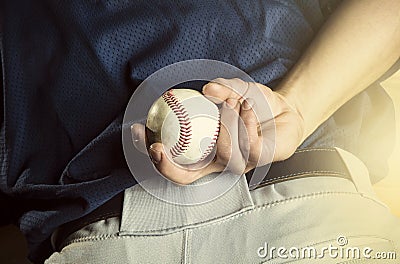 Baseball pitcher ready to pitch. Close up of hand Stock Photo