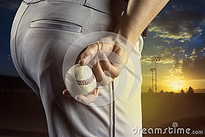 Baseball pitcher ready to pitch in an evening baseball game Stock Photo