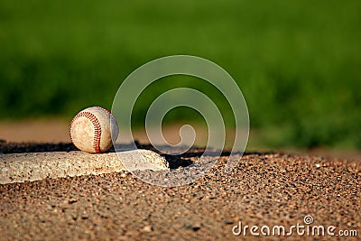 Baseball on pitchers mound Stock Photo