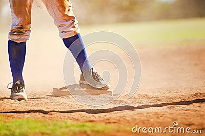 Baseball player on the base Stock Photo
