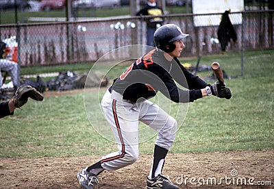 Baseball player prepares to bunt Editorial Stock Photo