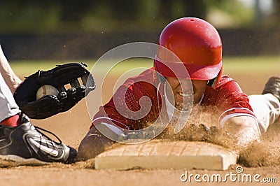 Baseball Player Sliding Into Base Stock Photo