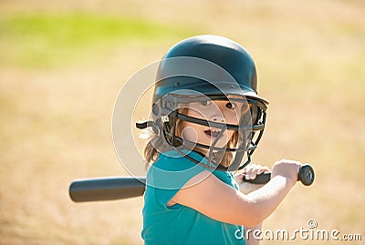 Baseball players kid swinging the bat at a fastball from the pitcher. Stock Photo