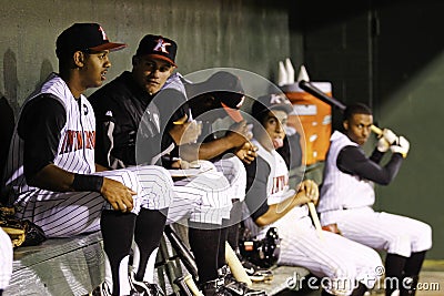 Baseball Players in Team Dugout Editorial Stock Photo