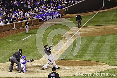 Baseball - Wrigley Field Batter Swings Hard Editorial Stock Photo