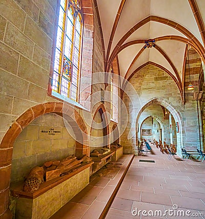 The line of medieval sculptures on the tombstones of nobles in Basel Minster Cathedral, on April 1 in Basel, Switzerland Editorial Stock Photo