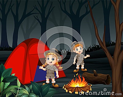 Cartoon of two zookeepers are camping in a dark forest Vector Illustration