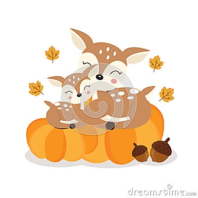 Cute deer mom and baby on pumkins in autumn. Stock Photo
