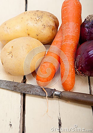 Basic vegetable ingredients carrot potato onion Stock Photo
