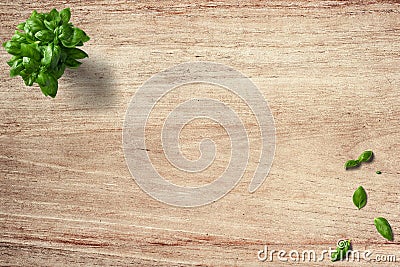 Basil, mint, Kitchen leaves on green and wooden background Stock Photo