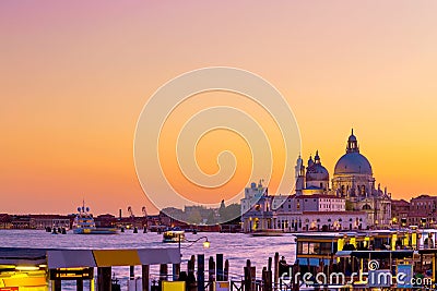 Basilica Santa Maria della Salute in Venice, Italy during beautiful summer day sunset. Famous venetian landmark Stock Photo