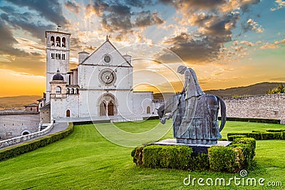 Basilica of St. Francis of Assisi at sunset, Umbria, Italy Stock Photo