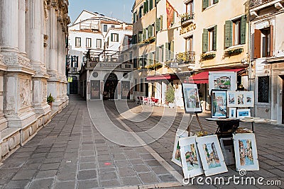 Basilica, venetian painter selling arts, Venice, Italy Editorial Stock Photo