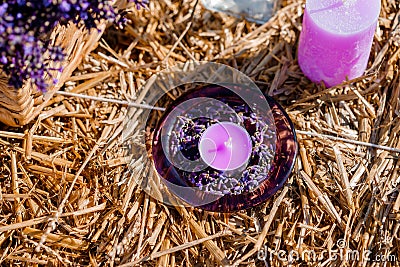 Basket with beautiful lavender in the field in Provance with Lavander water and candles. Harvesting season Stock Photo