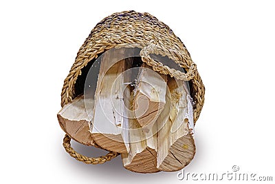 Basket of cut logs fire wood from. Stock Photo