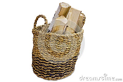 Basket of cut logs fire wood from. Stock Photo