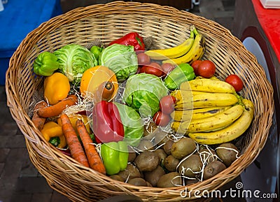Basket Filled with Fresh Fruit and Vegetables Stock Photo