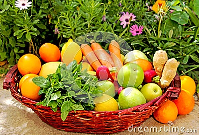 A basket of fresh fruit and vegetables Stock Photo