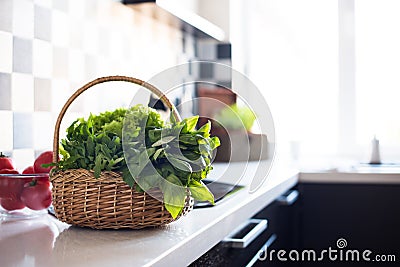 Basket with fresh greens Stock Photo