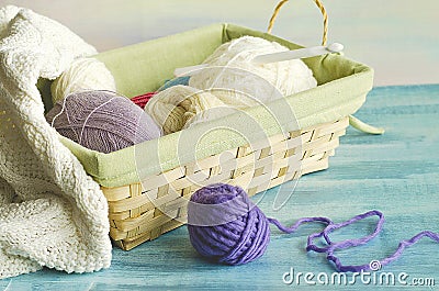 Basket with threads for knitting and crocheting. Stock Photo