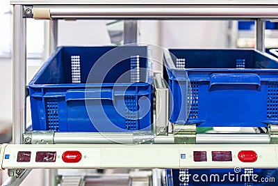 Basket or plastic box container on roller rack or aluminum shelf with electronic display smart module system for management â€“ Stock Photo