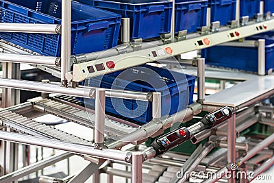 Basket or plastic box container on roller rack or aluminum shelf with electronic display smart module system for management â€“ Stock Photo