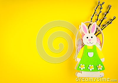 Basket in the shape of rabbit with eggs and pussy-willow Stock Photo