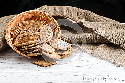 Basket with sweet homemade classical Italian crackers on light w Stock Photo