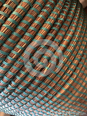 Basket texture, straw and turquoise rubber band Stock Photo
