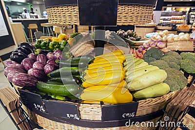 Basket of varied vegetables, zucchini, aubergines, broccoli, peppers, artichokes etc Stock Photo