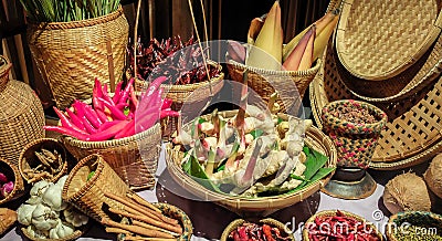 Basket of Various Thai Herbs for Food Recipe on Wooden Table in The Traditional Kitchen Stock Photo