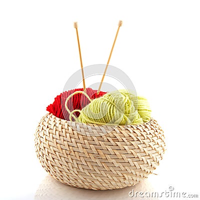 Basket with wool and needles Stock Photo