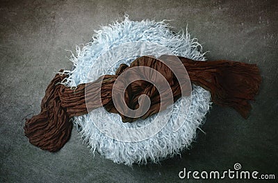 Basket with Wrap Newborn Backdrop for Photographers with a Single Light Setup Stock Photo