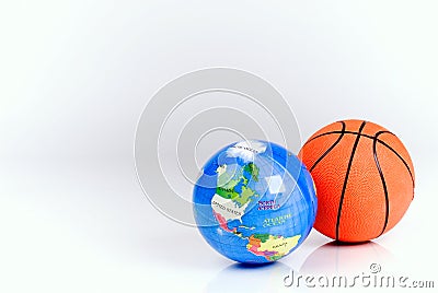 Basketball ball and the globe Stock Photo