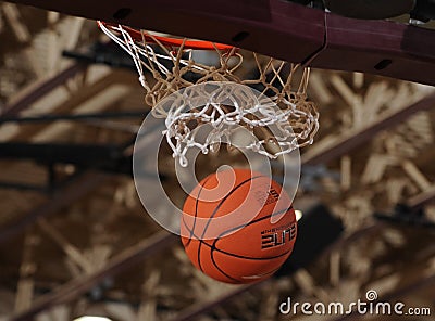 Basketball ball going through the net. Editorial Stock Photo