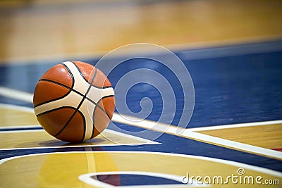 Basketball ball over floor in the gym Stock Photo