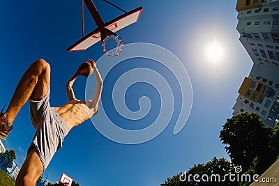 Basketball boy player street jump, sport competition Stock Photo
