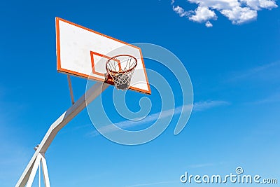 Basketball close up, basketball bal in hoop at sunny day Stock Photo