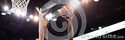basketball game ball going through hoop Stock Photo
