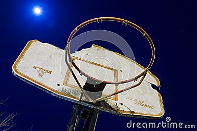 Basketball goal at night Stock Photo