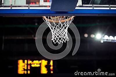Basketball going through the hoop Stock Photo