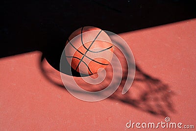 Basketball and net shadow Stock Photo