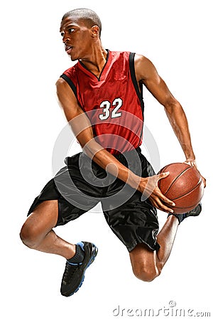 Basketball Player Dunking Ball Stock Photo