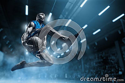 Basketball player on big professional arena during the game. Basketball player making slam dunk. Stock Photo