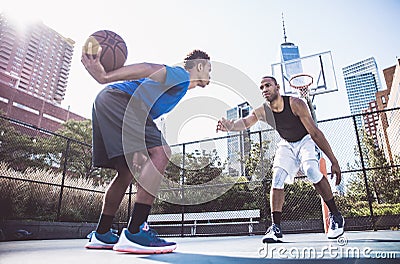 Basketball player playing hard Stock Photo