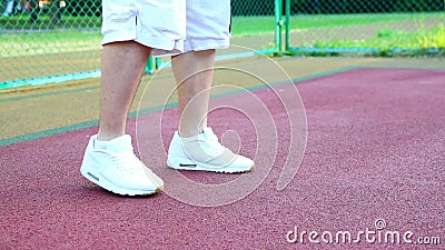 Basketball on the street, training for juggling a ball for basketball. The concept of sports, training, training on the. Street, self-motivation, discipline stock video footage Basketball on the street, training for juggling a ball for basketball. The concept of sports, training, training on the. Street, self-motivation, discipline stock video footage